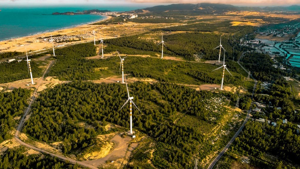 Aerial View of Coastal Wind Turbine Farm